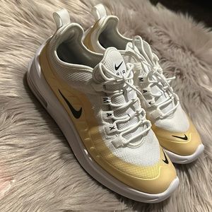 Great condition Nike sneakers women size 9 white/gold